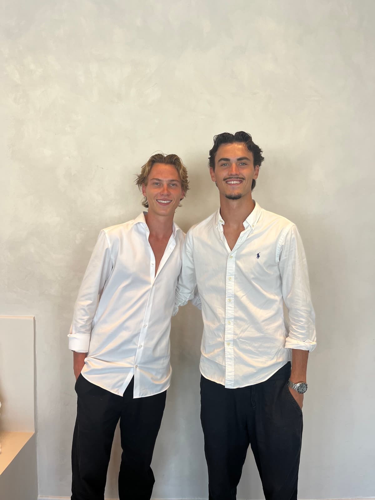 The two brothers who founded Sky Estates, in white shirts
